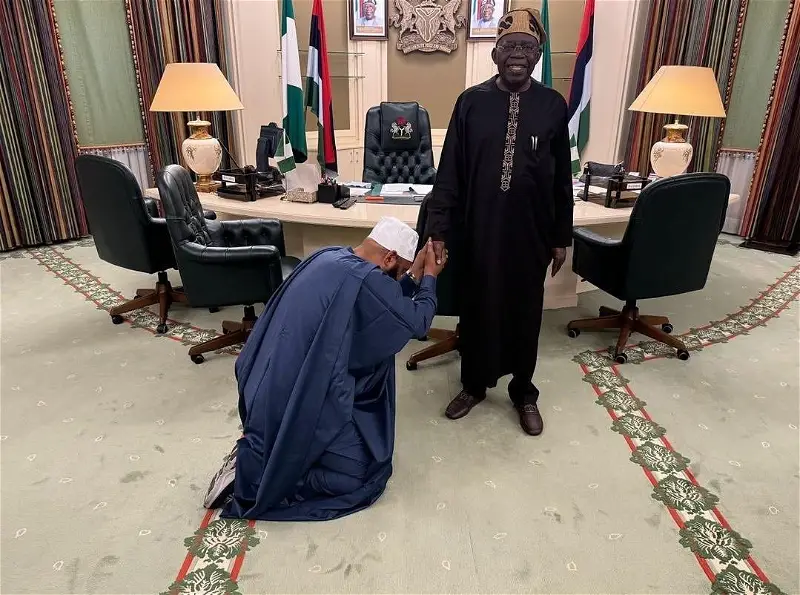Reactions As Niger Governor Kneels Before Tinubu During Visit